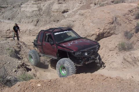 1981 Ford F-150 - This heavily modified pickup truck is equipped for extreme off-road terrain, a reinforced roll cage and oversized tires.