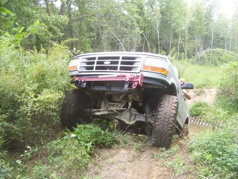 1995 Ford Bronco - Spare was in the water of the creek. Felt like my seatbelt was the only thing keeping me from rolling out the back window.
