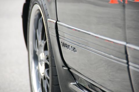 1993 Ford Taurus - The 'TAURUS SHO' emblem is visible on the side of the car, near the wheel.