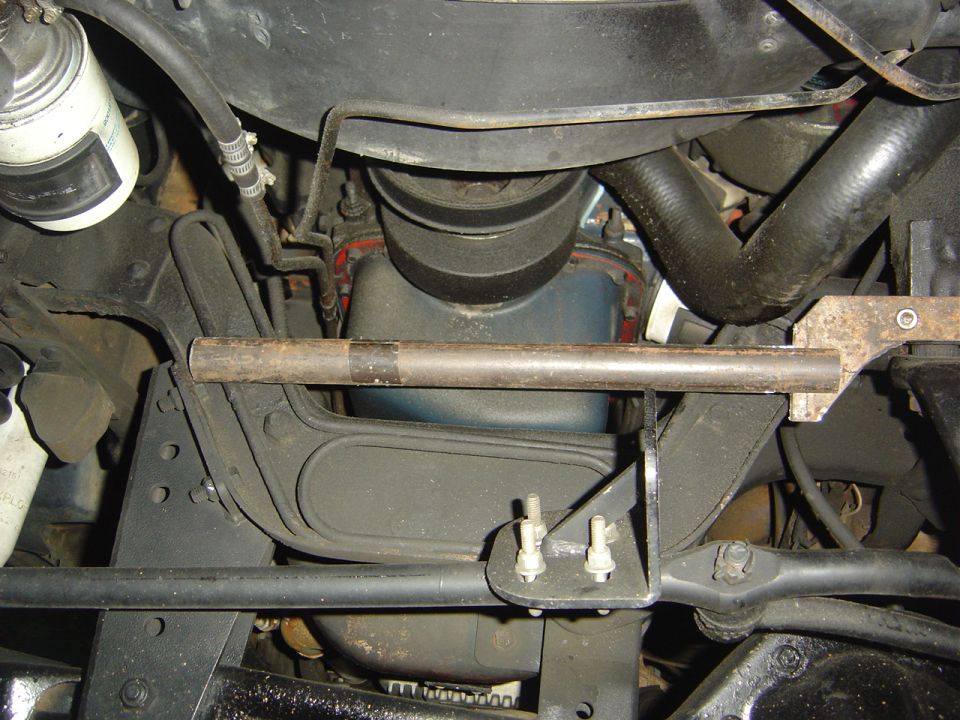 1986 Ford Bronco steering box bracket and engine components