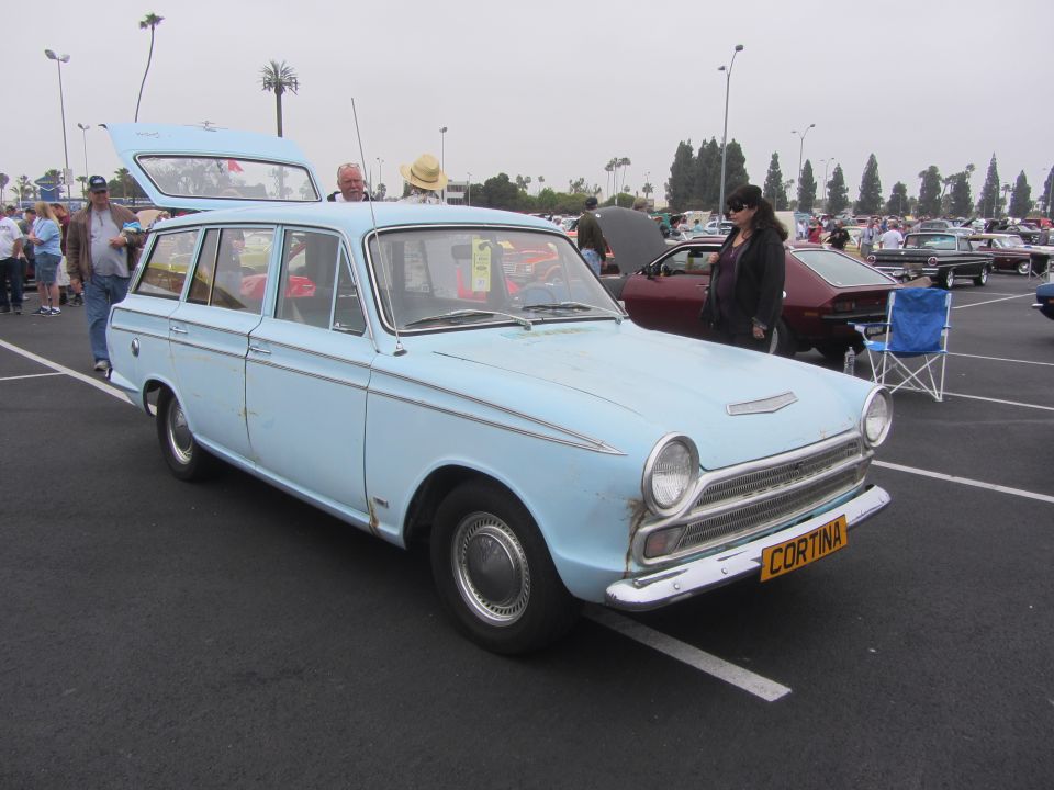 Light blue station wagon with 'CORTINA' plate. 1964 Ford Ranchero claim is incorrect