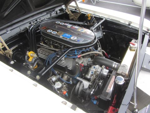 1964 Ford Ranchero - Detailed view of a V8 engine bay, showing the air cleaner, valve covers, and various engine components.