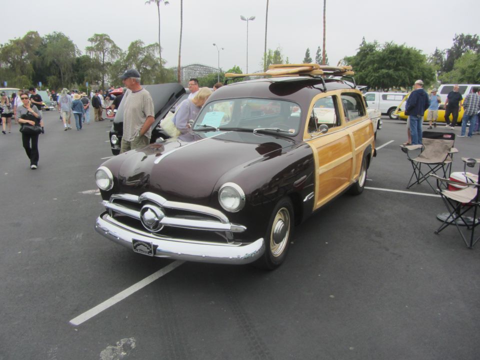 1950 Ford Woody Wagon with surfboards on roof rack