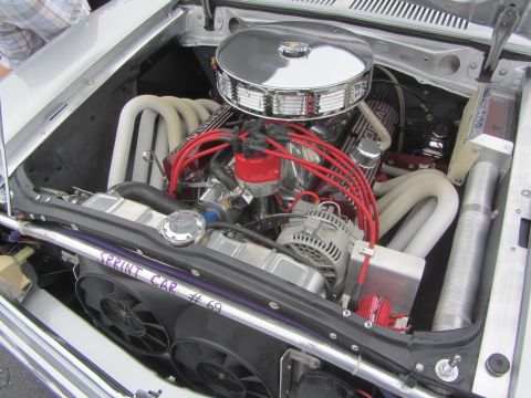 1964 Ford Ranchero - Custom engine bay features a chrome air cleaner and prominent red spark plug wires, with "SPRINT CAR #69" written on the radiator support.