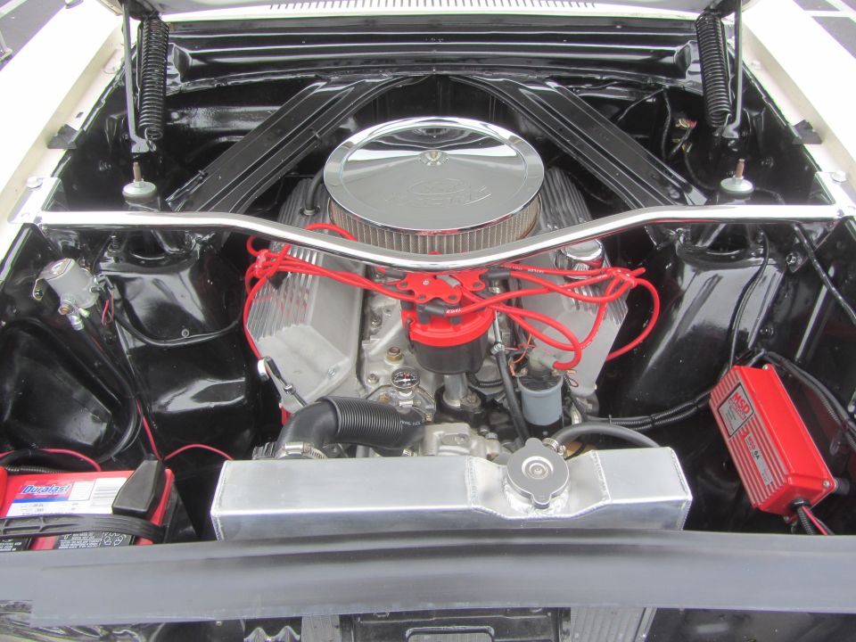 1964 Ford Ranchero engine bay with V8 engine, chrome air cleaner, and MSD ignition box
