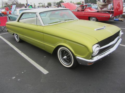 1964 Ford Ranchero - Lime green 1964 Ford Ranchero with a white roof and whitewall tires.