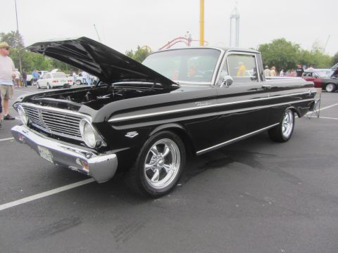 1964 Ford Ranchero - This black Falcon Ranchero has a custom look with chrome wheels and a lowered stance.