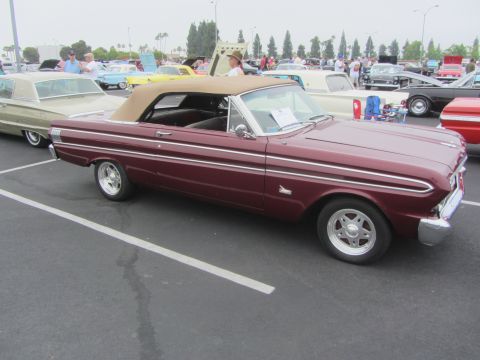 1964 Ford Ranchero - This maroon 1964 Ford Falcon convertible features a tan top and chrome accents.