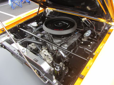 1964 Ford Ranchero - The engine bay is clean and detailed, a Ram Air cleaner and chrome valve covers.