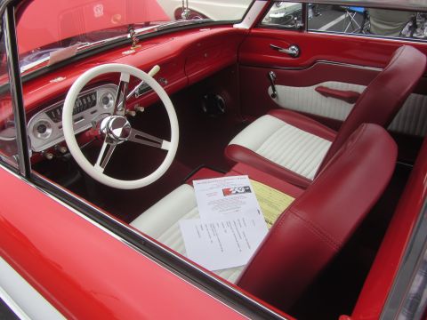 1964 Ford Ranchero - Interior view of a 1964 Ford Ranchero, showing the dashboard, steering wheel, and seats.