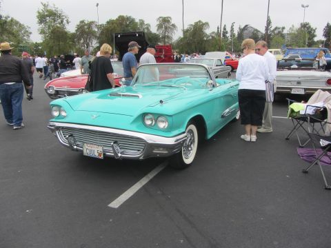 1964 Ford Ranchero - Turquoise 1958 Ford Thunderbird convertible at a car show, license plate CUUL 58.