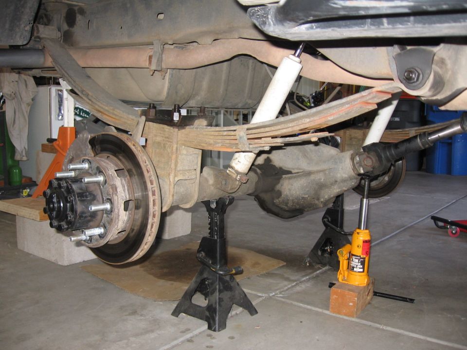 So this is what is being replaced, stock 17 yr old leafs with rancho dual 3" add a leaf plus 1" zero rate and a solid steel block/wedge.  ride wasn't great, didn't like the block, and the AAL's you can see were leaf 2 and 3 from the top, with no diamond cut and no pad, which added to the mediocre ride.