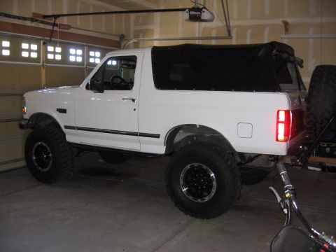 1995 Ford Bronco - As it sits after new leafs. Before, passenger side rear was 43 1/2, driver 43 7/8. After, passenger is 44 1/4, driver 44 1/4 keep in mind I…