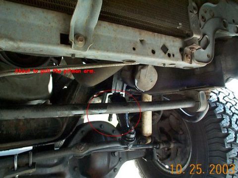 1992 Ford Bronco - Getting ready to remove the pitman arm with a puller, you definitely want to use a puller.