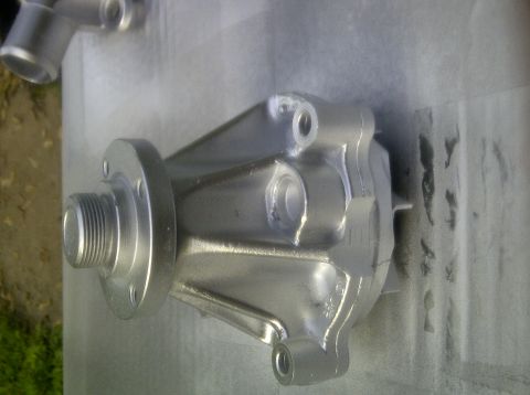 2000 Ford Crown Victoria - Water pump. PITA to remove. I used a hammer,chisel and flat head. Note...use a towel where you're tapping as not to damge the metal. Mine i…