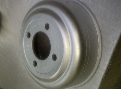 2000 Ford Crown Victoria - Water pump pulley cover matte aluminum. I taped off where the belt rides