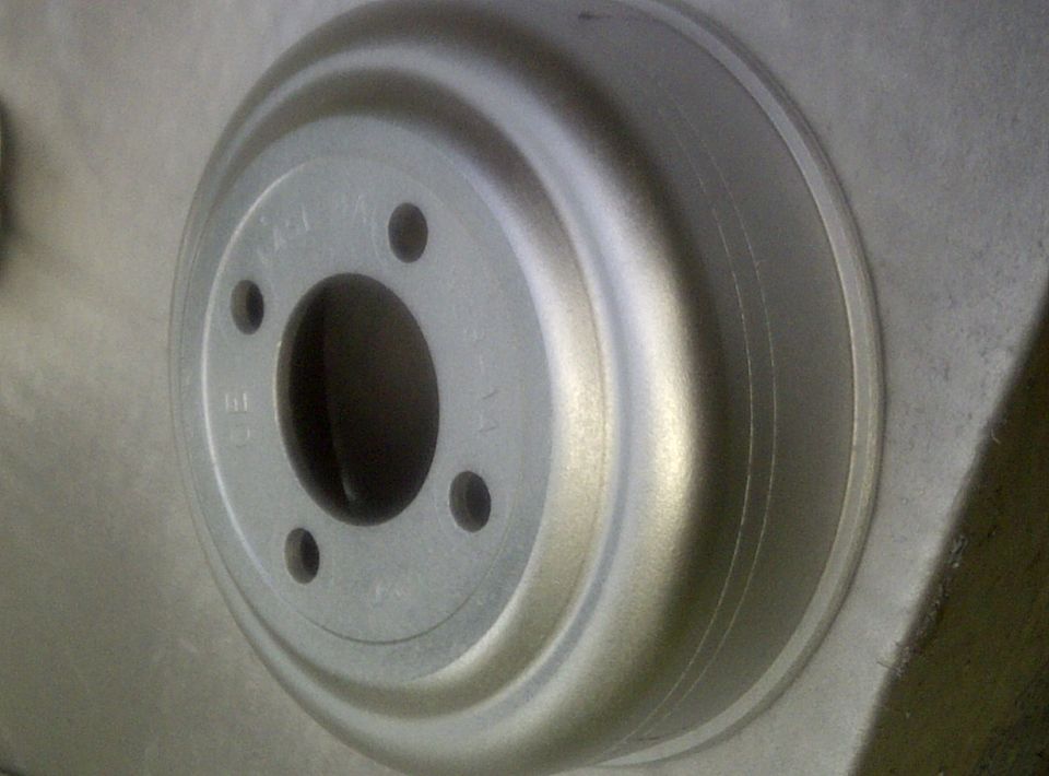 Water pump pulley cover matte aluminum.
I taped off where the belt rides