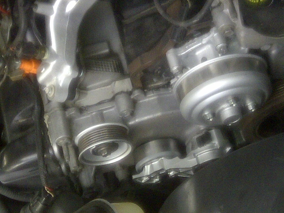 Engine water pump and pulley system