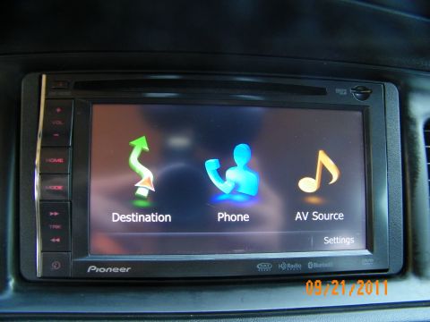 2003 Ford Crown Victoria - Aftermarket Pioneer head unit main menu with three function icons and settings option