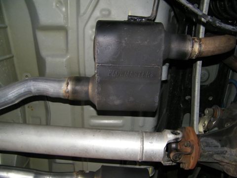 2003 Ford Crown Victoria - Installed Flowmaster muffler beside the driveshaft and U-joint on the underbody