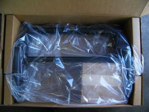 2003 Ford Crown Victoria - Black tubular accessory sealed in plastic wrap within a cardboard box