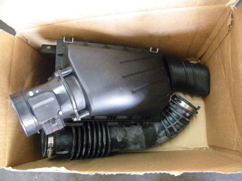 2003 Ford Crown Victoria - Factory-style air box and intake hose with MAF sensor packed inside a cardboard box.