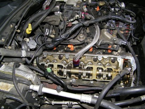2003 Ford Crown Victoria - Detailed view of an open cylinder head, valve springs and timing chain in engine bay