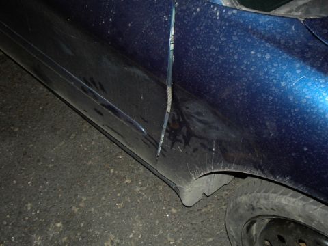 2001 Ford Taurus - Fender damage after running into a drainage ditch for an on-ramp to I-25