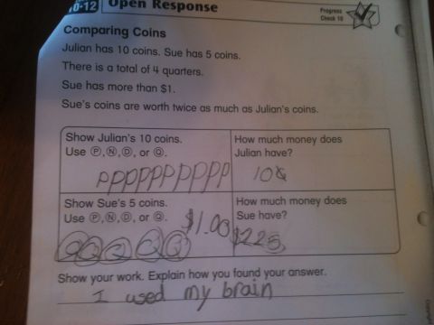 2000 Ford E350 - A math worksheet shows a student's work on coin problems, with answers written in pencil.