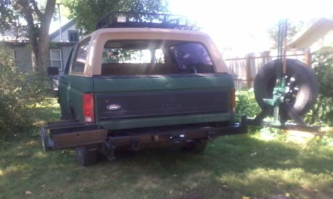 1986 Ford Bronco - Both rear swing arms opened up wide.