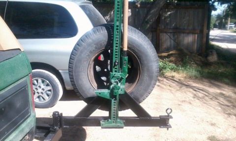 1986 Ford Bronco - Mounting location for my hi-lift jack. It sits on a plate behind the spare and bolts to the tire carrier with a wingnut.