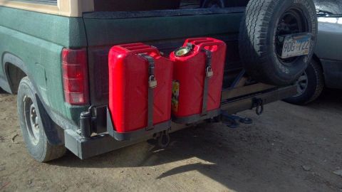 1986 Ford Bronco - OK, this is a little better. I found an e-bay surplus store that was selling these locking straps for $20 a pair. Jerry cans have a tendenc…
