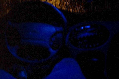 1996 Ford Taurus - The dashboard interior is illuminated with blue LEDs, showing the steering wheel and instrument cluster.
