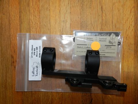 1996 Ford Bronco - A LaRue Tactical scope mount is shown with its packaging and product information label.
