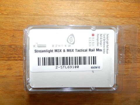 1996 Ford Bronco - This is packaging for a tactical light rail mount, not a vehicle part.