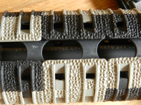 1996 Ford Bronco - Firearm handguard shows markings including 'NATO 1/7 CL'.