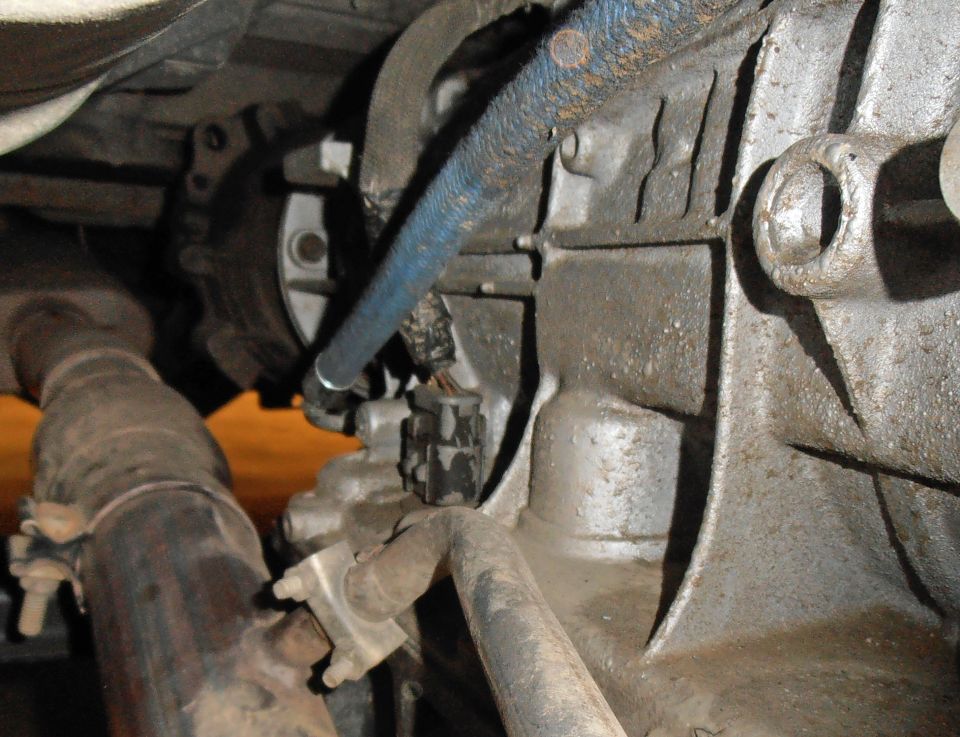 Transmission housing and exhaust pipe detail