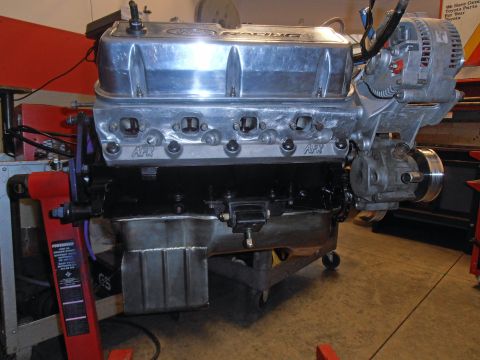1990 Ford Bronco - Close-up of a performance engine AFR valve covers and Ford Racing branding, likely a custom build.