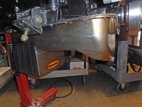 1990 Ford Bronco - Close-up of an engine oil pan with a visible Milodon sticker.