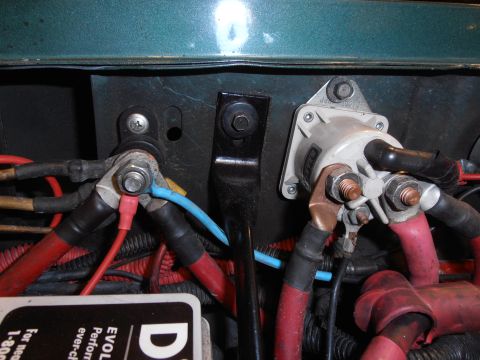 1990 Ford Bronco - Engine bay wiring with starter solenoid and battery connections visible.
