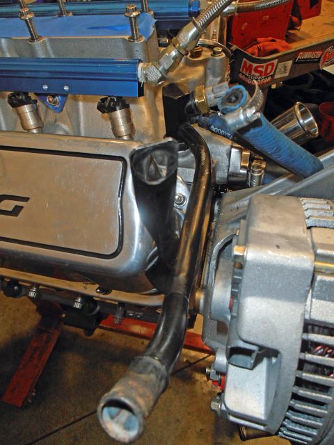 1990 Ford Bronco - Engine components, including fuel injectors and alternator, are visible in this close-up shot.