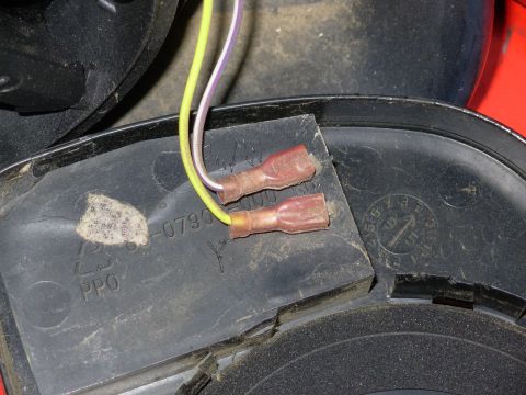 1983 Ford Bronco - Passenger signal mirror LED wiring colors. If the wires are reversed, the LEDs won't work. Scratch the colors into the plate before disconn…