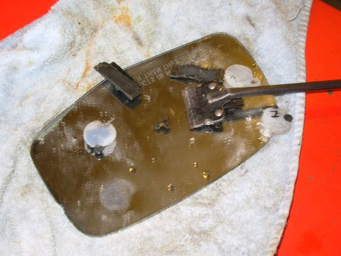 1983 Ford Bronco - Use a razor to remove all residue. Originally, I tried to scrape it while holding the glass by hand, and (no, I didn't cut myself) I let th…