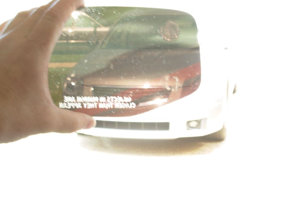 All mirror glass for these trucks is half-silvered, so it all works with signal mirrors.  But some aftermarket glass isn't exactly the same size/shape, so it may not fit on the original backing plate.  Ford glass does.