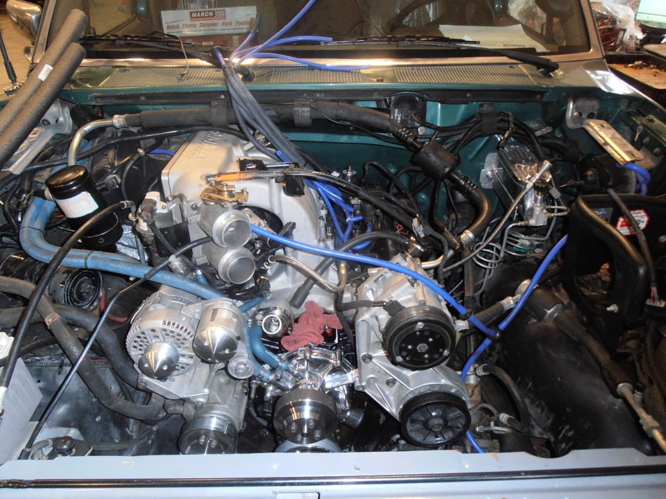 Engine bay with custom intake and dual throttle bodies