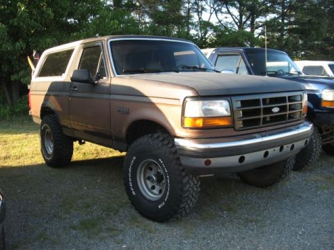 1978 Ford Bronco - This lifted 1992 Ford Bronco features aggressive off-road tires and a two-tone paint scheme.