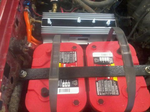 1995 Ford F-150 - Underhood view of a dual battery system with an isolator and associated wiring.