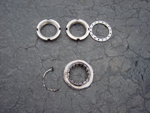 1995 Ford Bronco - I converted to Warn premium’s so I needed the spindle nut conversion. The new nut system is on top and the old one is on the bottom. You ne…