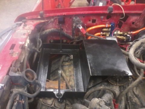 1995 Ford F-150 - Engine bay with a custom dual battery tray and isolator installed, new wiring and plumbing.
