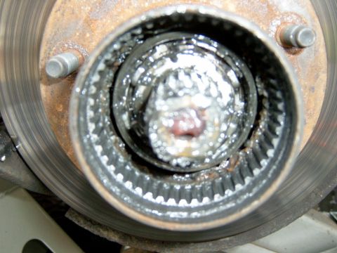 1995 Ford Bronco - Once you have the front part of the auto hub out, there is a small C-clip holding the second half in, there are also 3 washers that should…